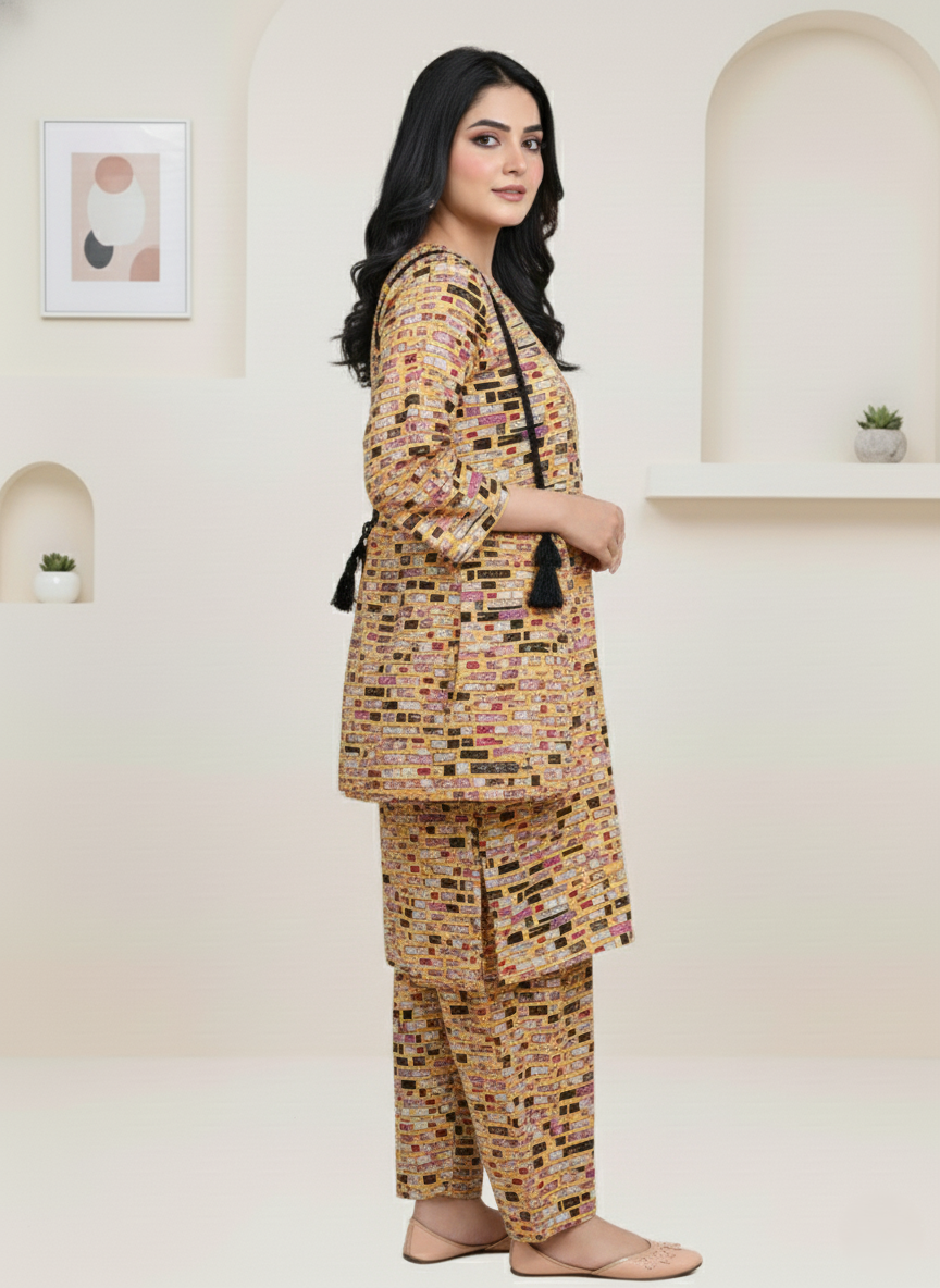 Woman wearing a patterned outfit in a minimalistic room.