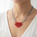 Necklace with red lips pendant on a mannequin