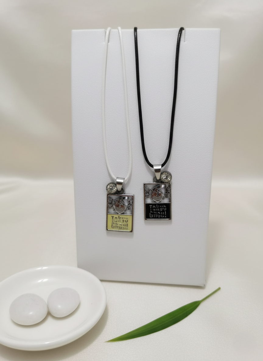 Two necklaces with pendant tags on a white background