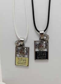 Two necklaces with rectangular pendants featuring 'Tokyo Ghoul' branding on a white background.
